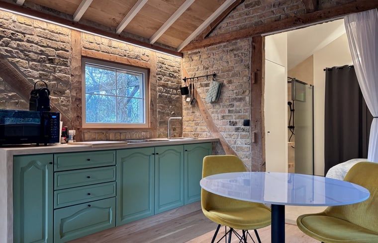 Attractive bedroom in Cottage in Alveringem, a vacation home in Alveringem, West Flanders, overlooking serene nature.