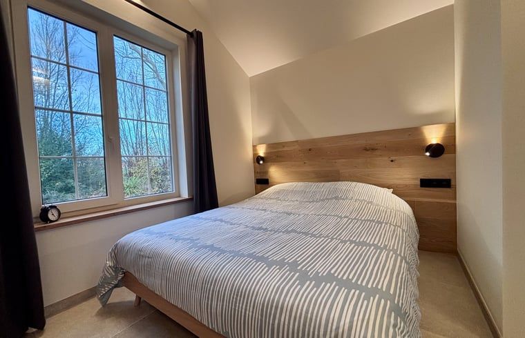 Modern bathroom in Cottage in Alveringem, a vacation home in Alveringem, West Flanders, with stylish sink and rustic look.