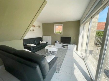 Gezellige woonkamer in Residentie Arthur - Lombardsijde vakantiehuis, West-Vlaanderen.