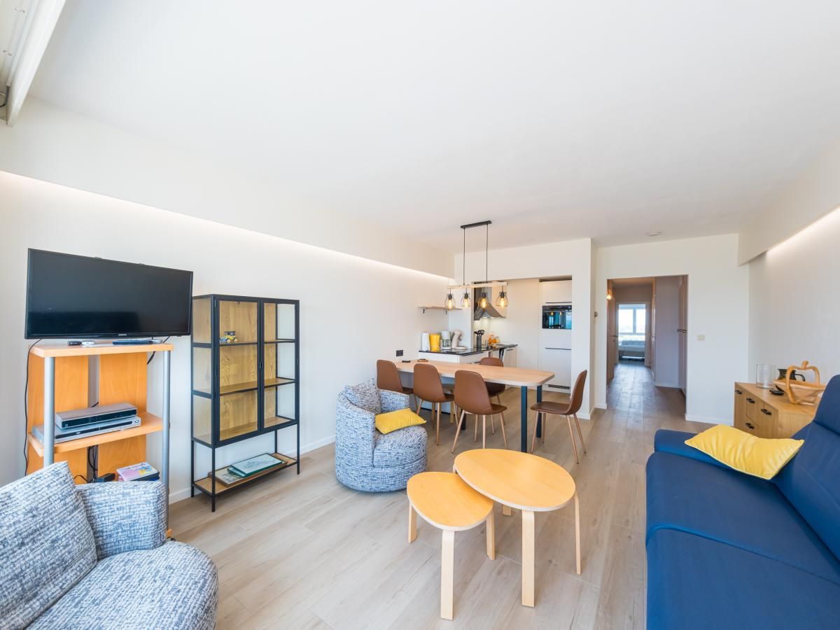 Gemuetliches Interieur des Ferienhauses Reno - 0701 in Middelkerke, Westflandern, mit moderner Einrichtung und komfortabler Sitzecke.