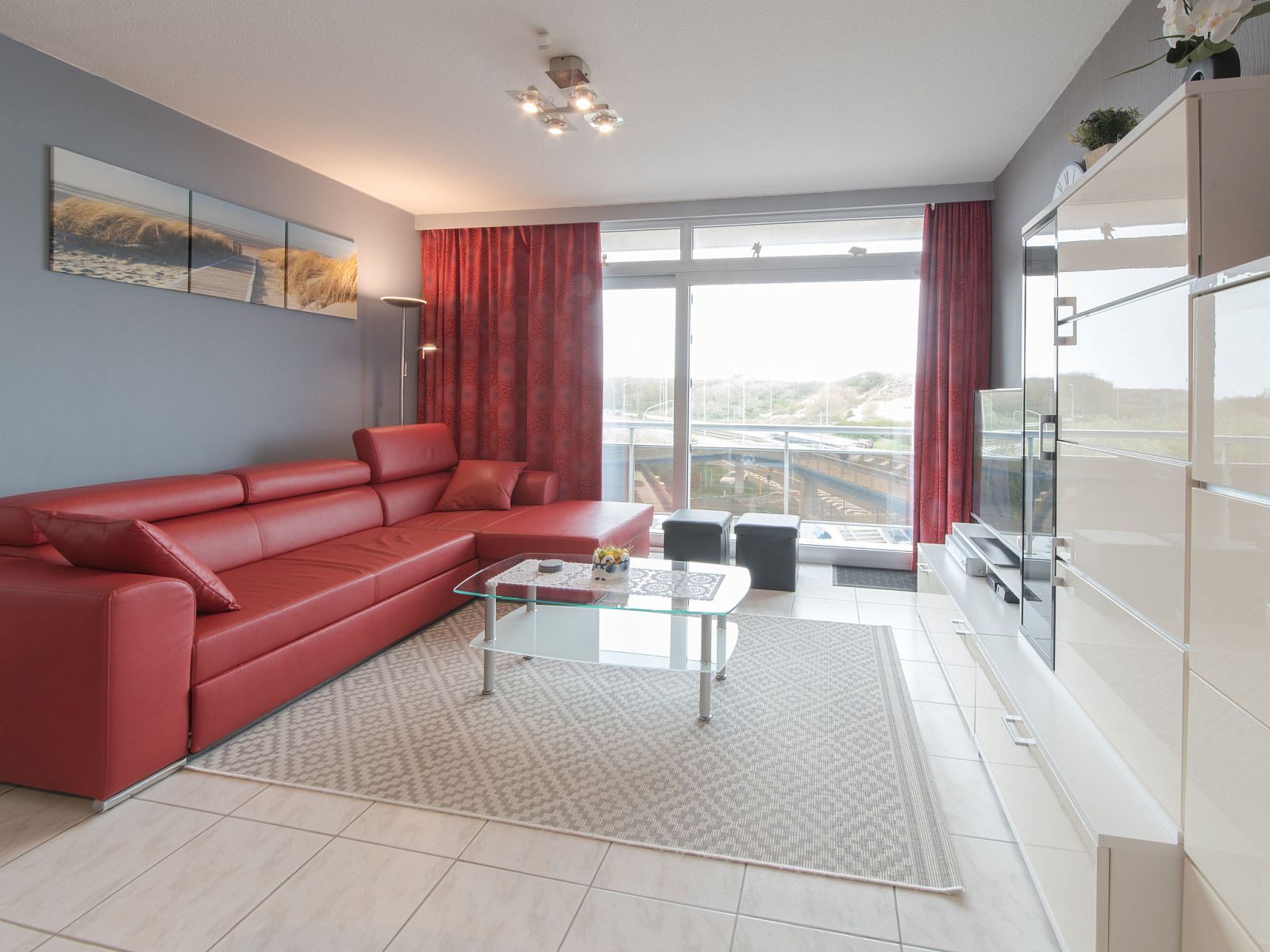 Stylishly furnished living room of Apartment Apt. 403 in Bredene, Belgium, with modern interior and coastal views.