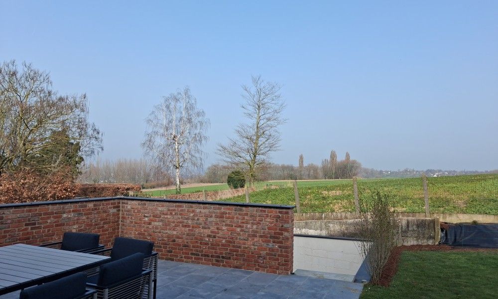 't Laarhuys ***** vakantiehuis in de Vlaamse Ardennen, Oost-Vlaanderen, met prachtig uitzicht vanaf het terras op het omliggende landschap.