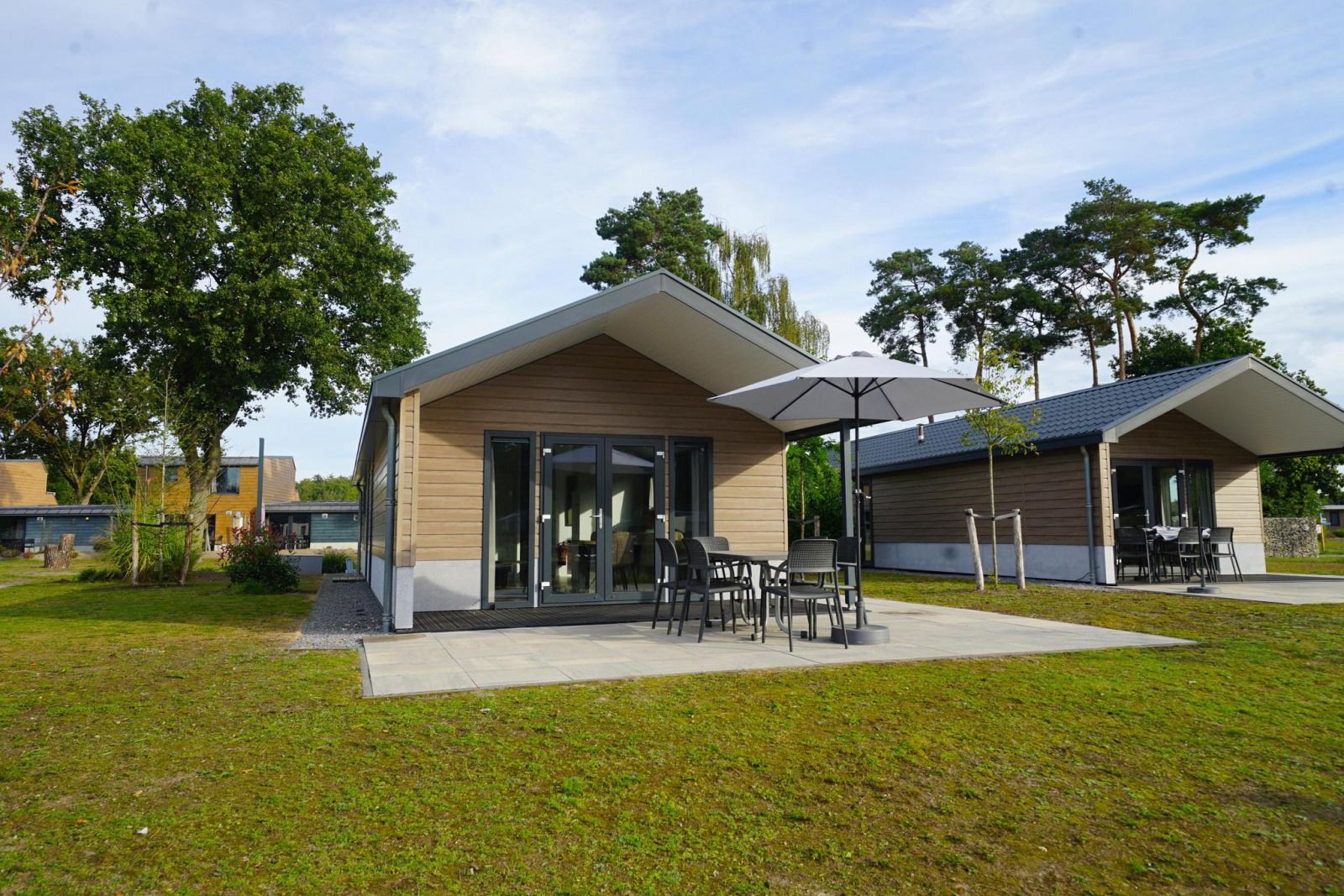 Velthorst vacation home in Mol, Antwerp surrounded by nature with terrace and modern architecture.