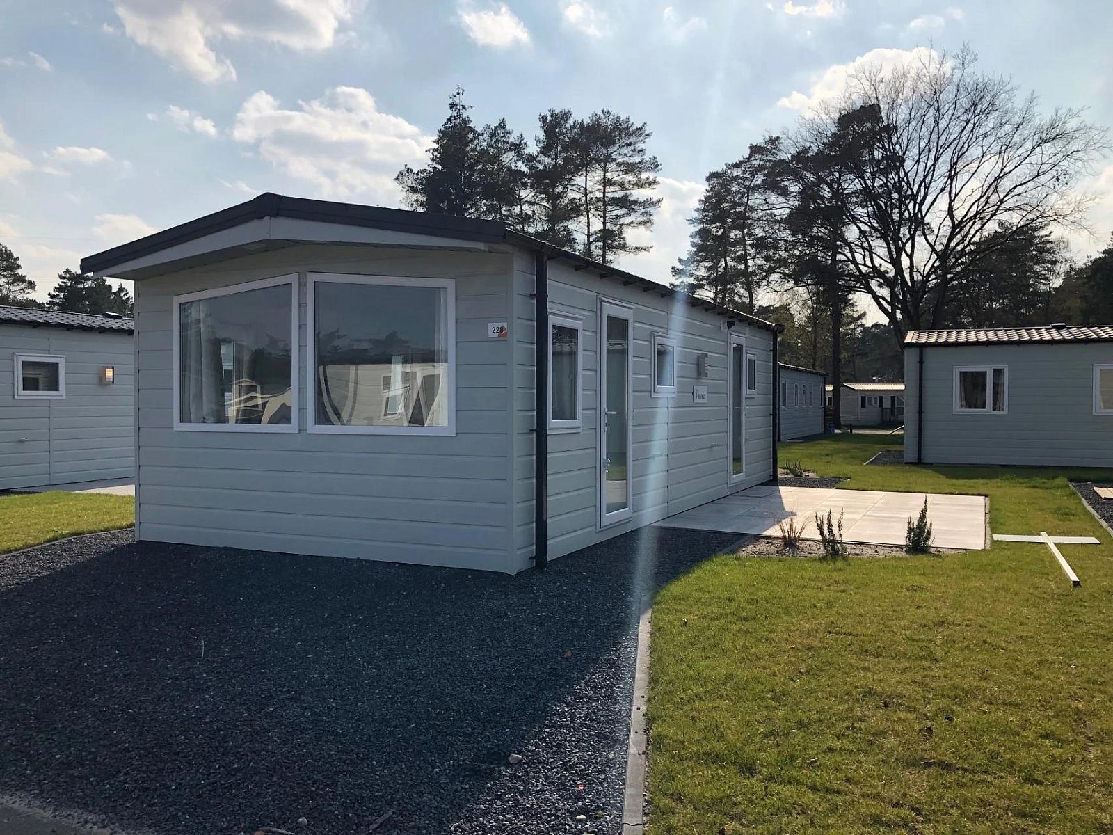 Berkel 4 vacation home in Mol, Antwerp, Belgium with modern exterior and green surroundings for a relaxing stay.