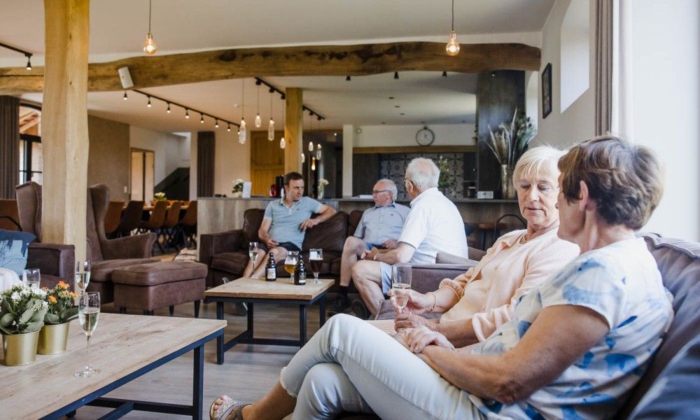Cozy sitting area in Driehoekshoeve vacation home, Kasterlee, Antwerp for relaxation.