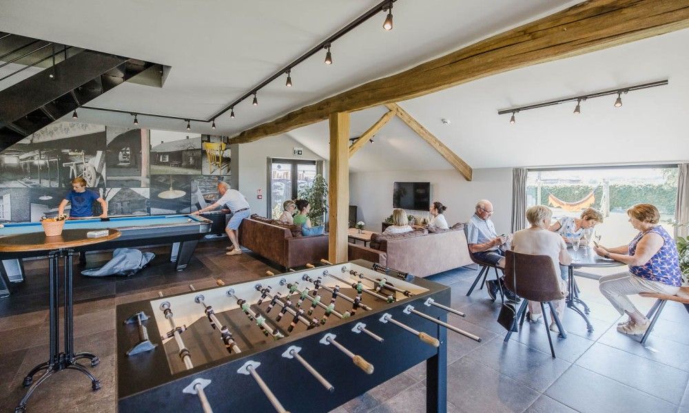 Recreation room with table soccer in Driehoekshoeve vacation home, Kasterlee, Antwerp.