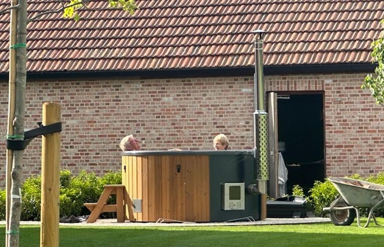 Enjoy relaxing in the hot tub at Holiday Home in Kasterlee, located in green Antwerp, Belgium.