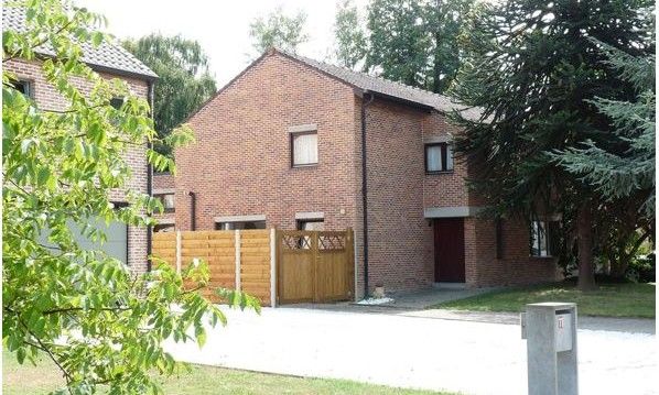 StadOase-Hasselt vakantiehuis in Hasselt, Belgie met charmante bakstenen gevel.