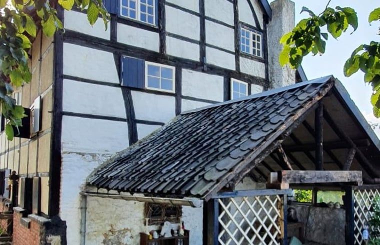 Huisje in Sint Pietersvoeren, Limburg, Belgie: authentiek vakantiehuis met charmante vakwerkgevel en landelijke sfeer.