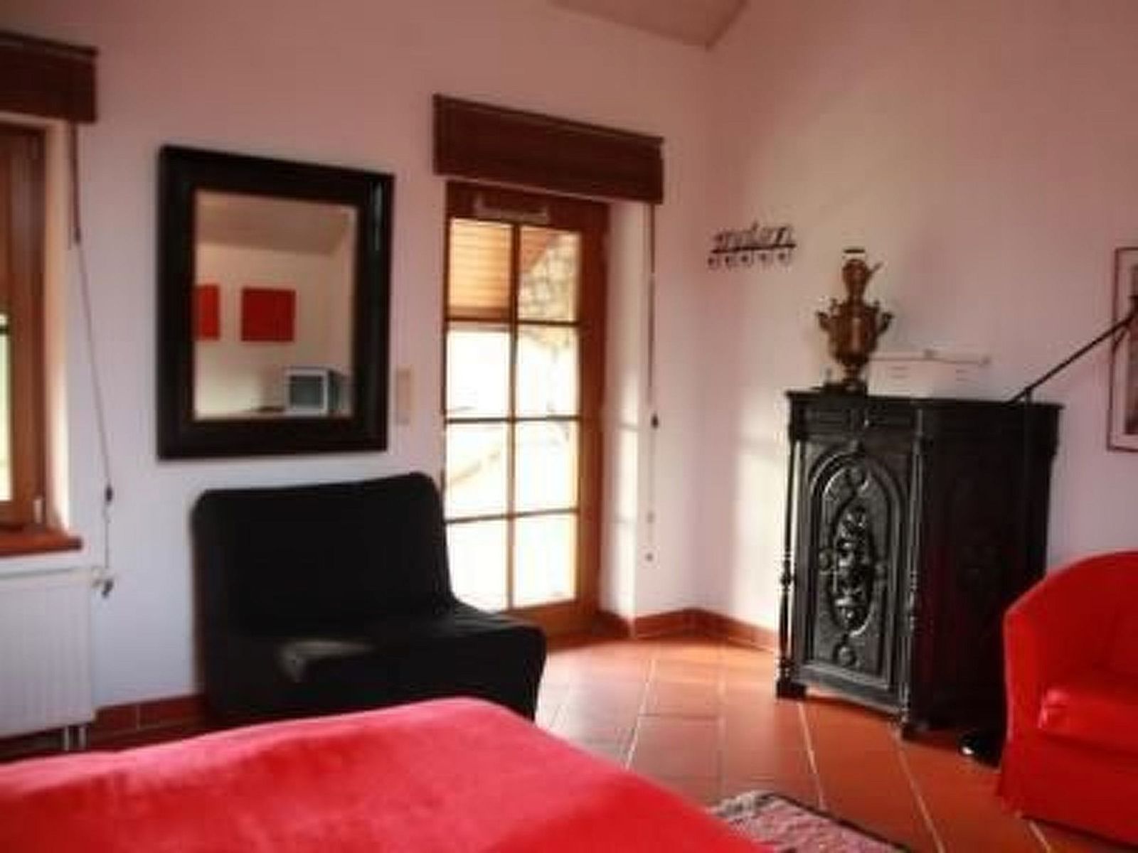 Cozy indoor area of Apartment Vue au Jardin in Hombourg, Ardennes, with stylish decor and garden views.