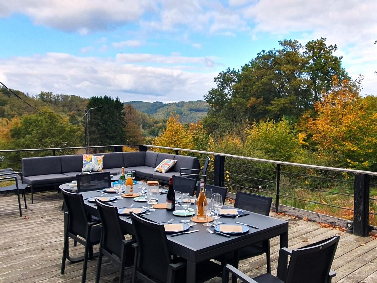 Enjoy the panoramic view from the terrace of chalet Agathe in Laforet, Ardennes, perfect for a relaxing vacation in nature.