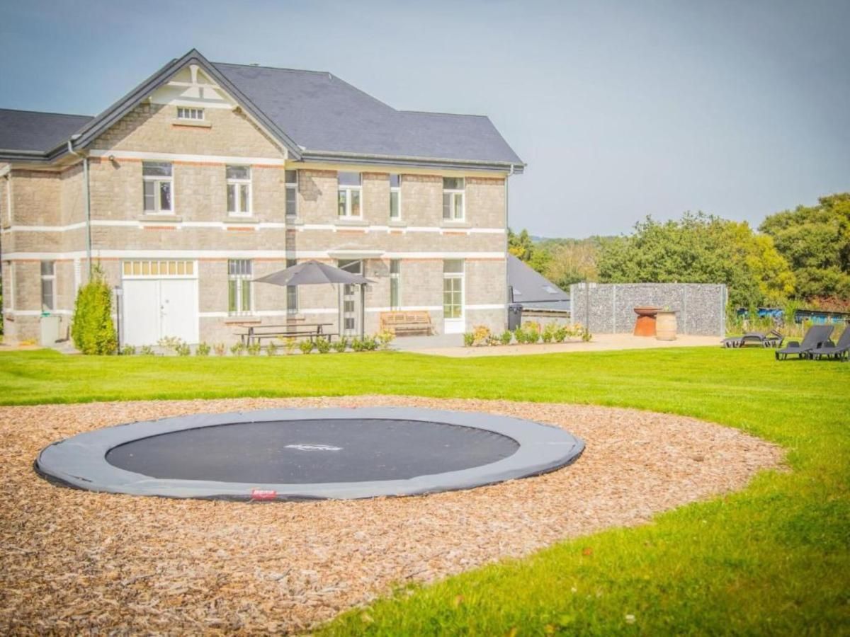 Ma Dame Jeanne vakantiehuis in Durbuy, Ardennen, Belgie, met ruime tuin en trampoline voor ontspanning in de natuur.