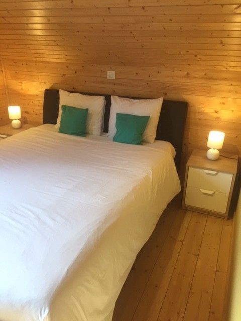 Comfortabele slaapkamer in Chalet Eikenblad, ontspannend vakantiehuis in Durbuy, Ardennen.