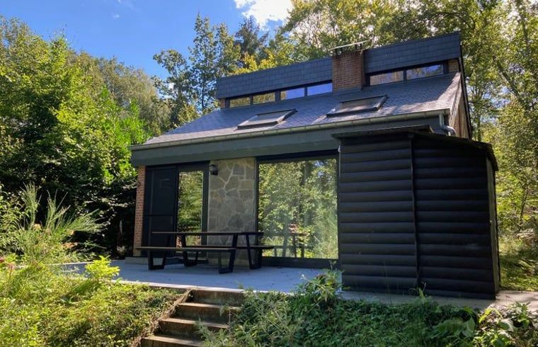 Cottage in Izier, a charming vacation home in the Ardennes, Luxembourg, Belgium, surrounded by green nature and peaceful surroundings.