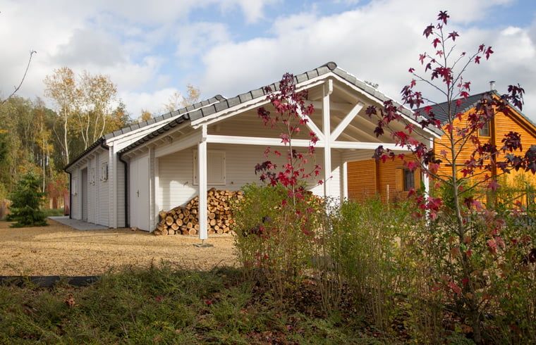 Cottage in Erezee, a charming cottage in the Ardennes, Luxembourg, Belgium, surrounded by nature and rustic autumn colors.