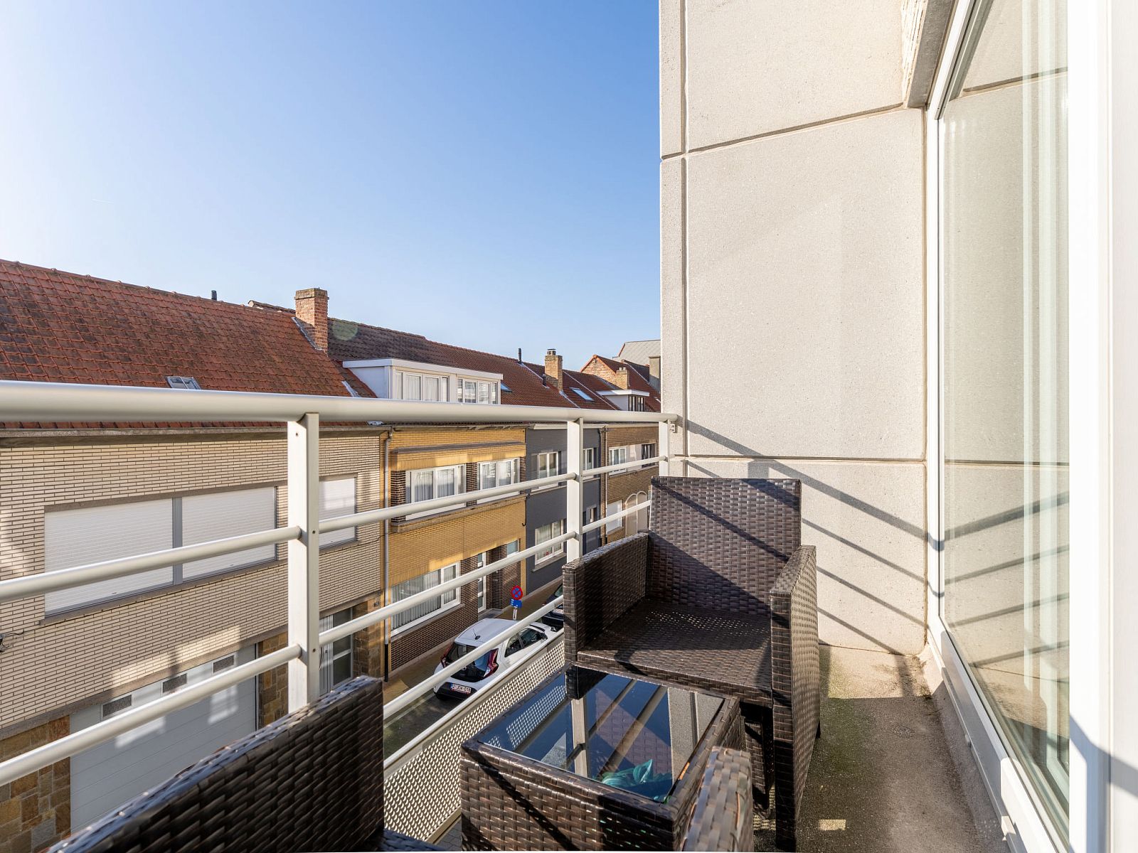Enjoy the balcony of Apartment Zandloper in Bredene on the Belgian coast-the perfect spot for relaxing moments in a charming vacation home.