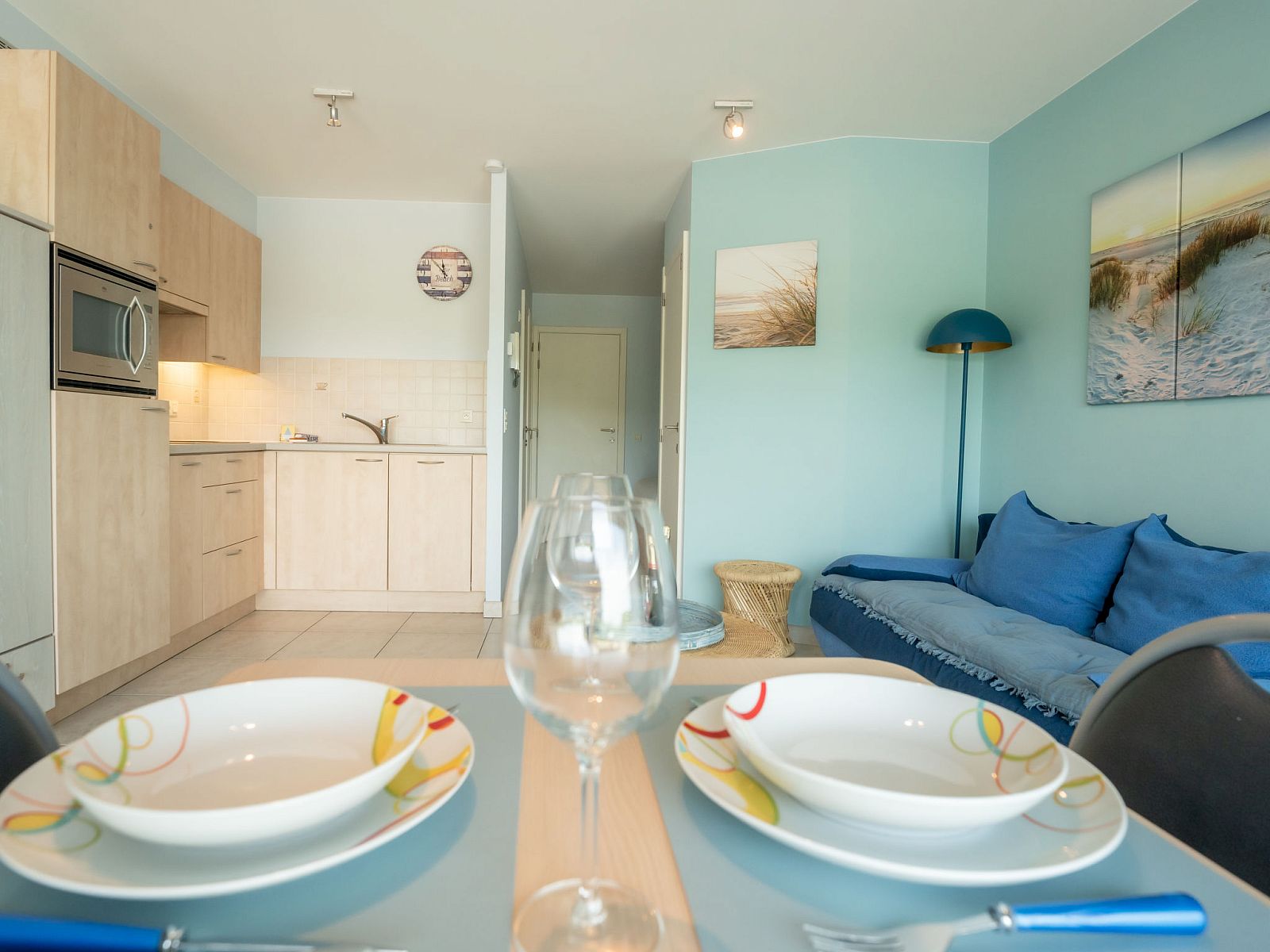 Cozy indoor space of Apartment Lautrec in Bredene on the Belgian coast, with modern kitchen and comfortable seating area.