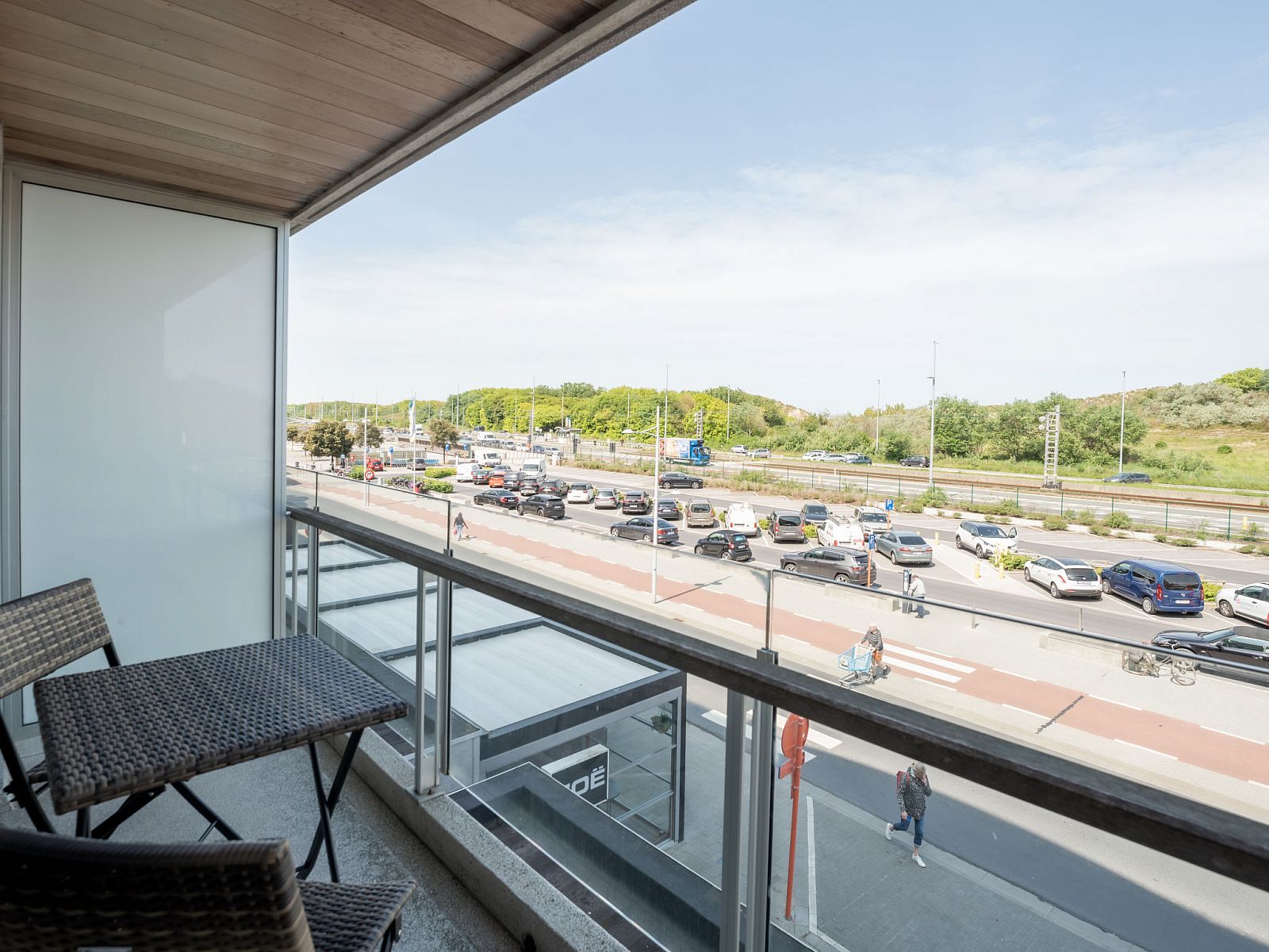Enjoy the view from the balcony of Apartment Lautrec in Bredene on the Belgian coast, a comfortable vacation home.