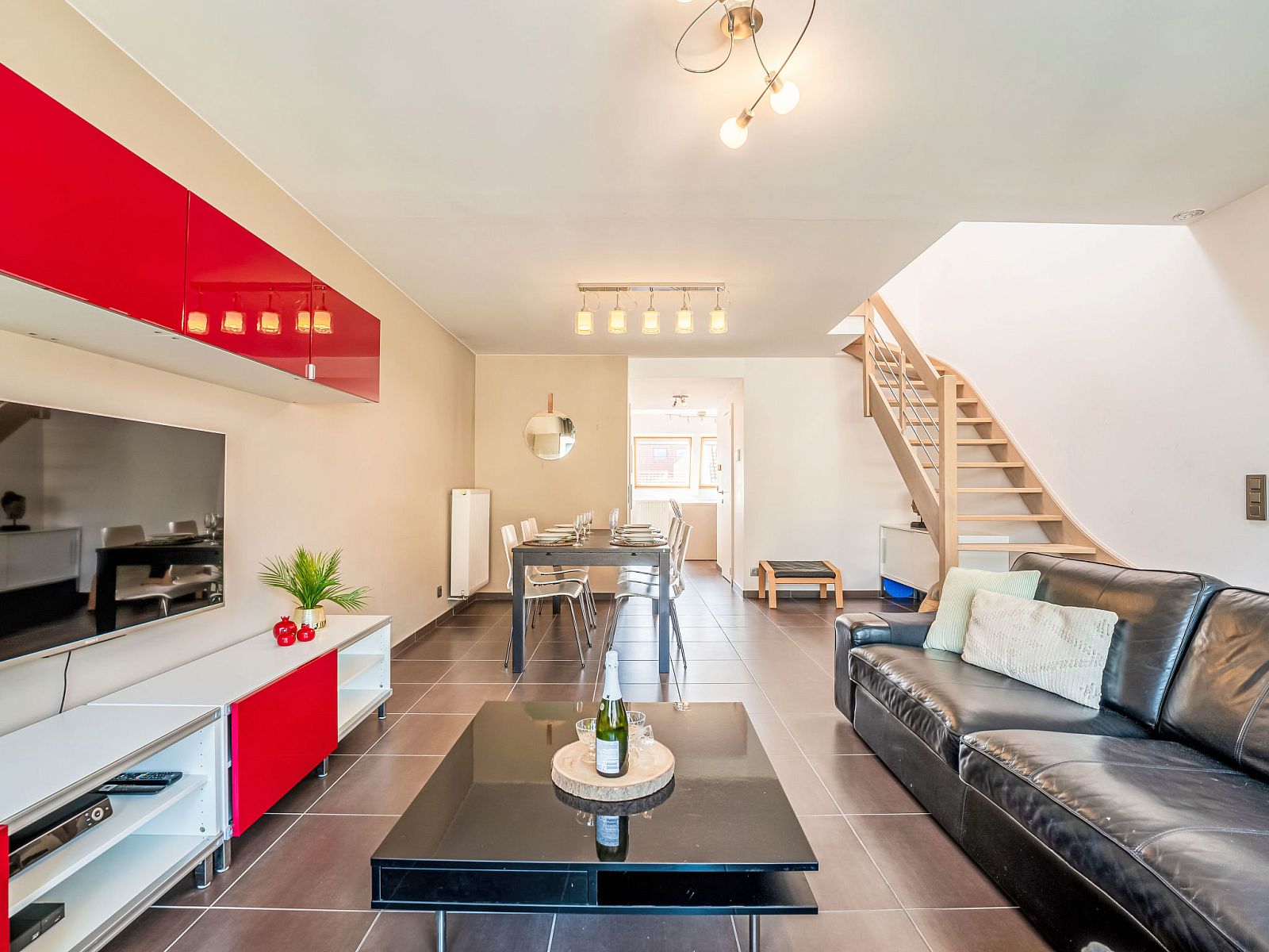 Stylish living room of Apartment Ter Duyne in Bredene, Belgian coast, with modern furnishings and comfortable seating area.