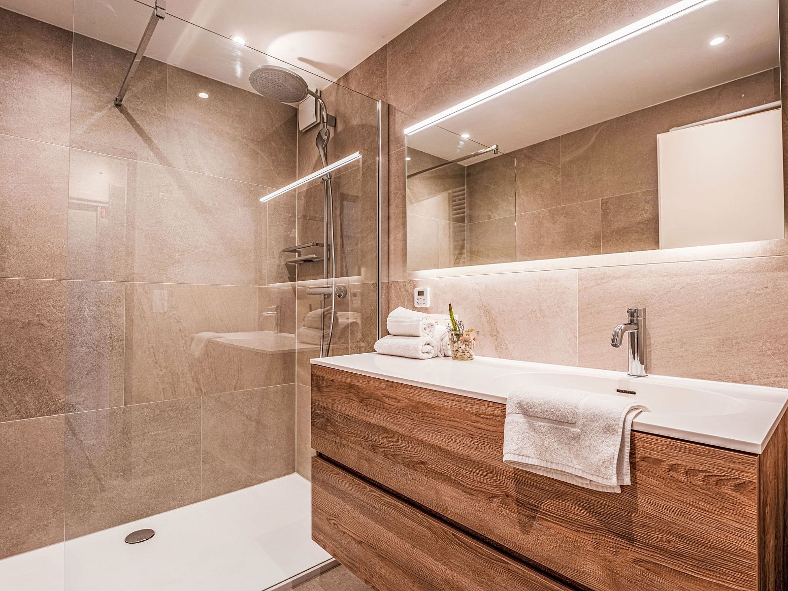 Luxury bathroom in Apartment 103, Bredene, Belgian coast, with modern shower and stylish sink for a comfortable stay.