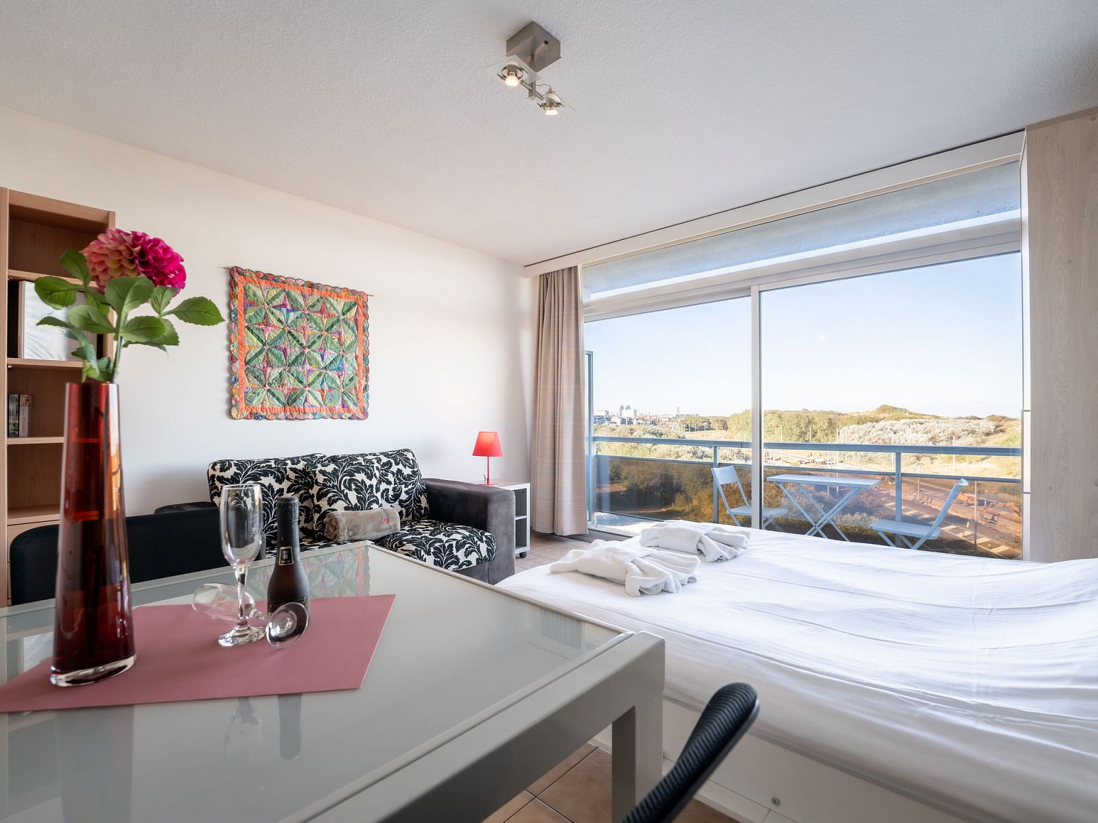 Apartment Studio 62-705 in Bredene, Belgian coast, offers a bright indoor space overlooking the dunes, ideal for a relaxing stay.