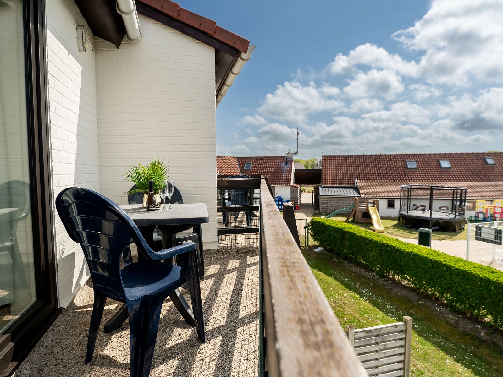 Enjoy the sunny balcony of Apartment Zeewind II A 11 in Bredene, Belgian coast, overlooking the peaceful surroundings.