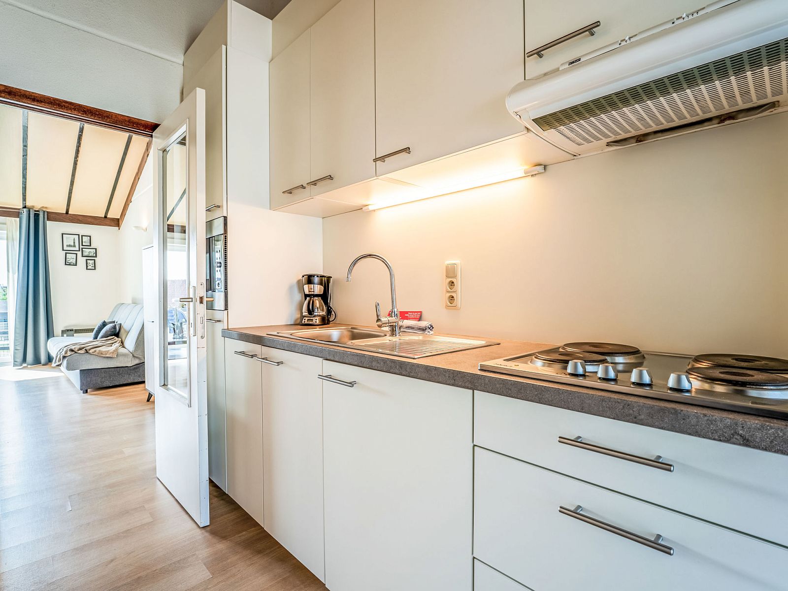 Modern kitchen in Apartment Zeewind II A 11, Bredene, Belgian coast, with bright decor and comfortable interior space.