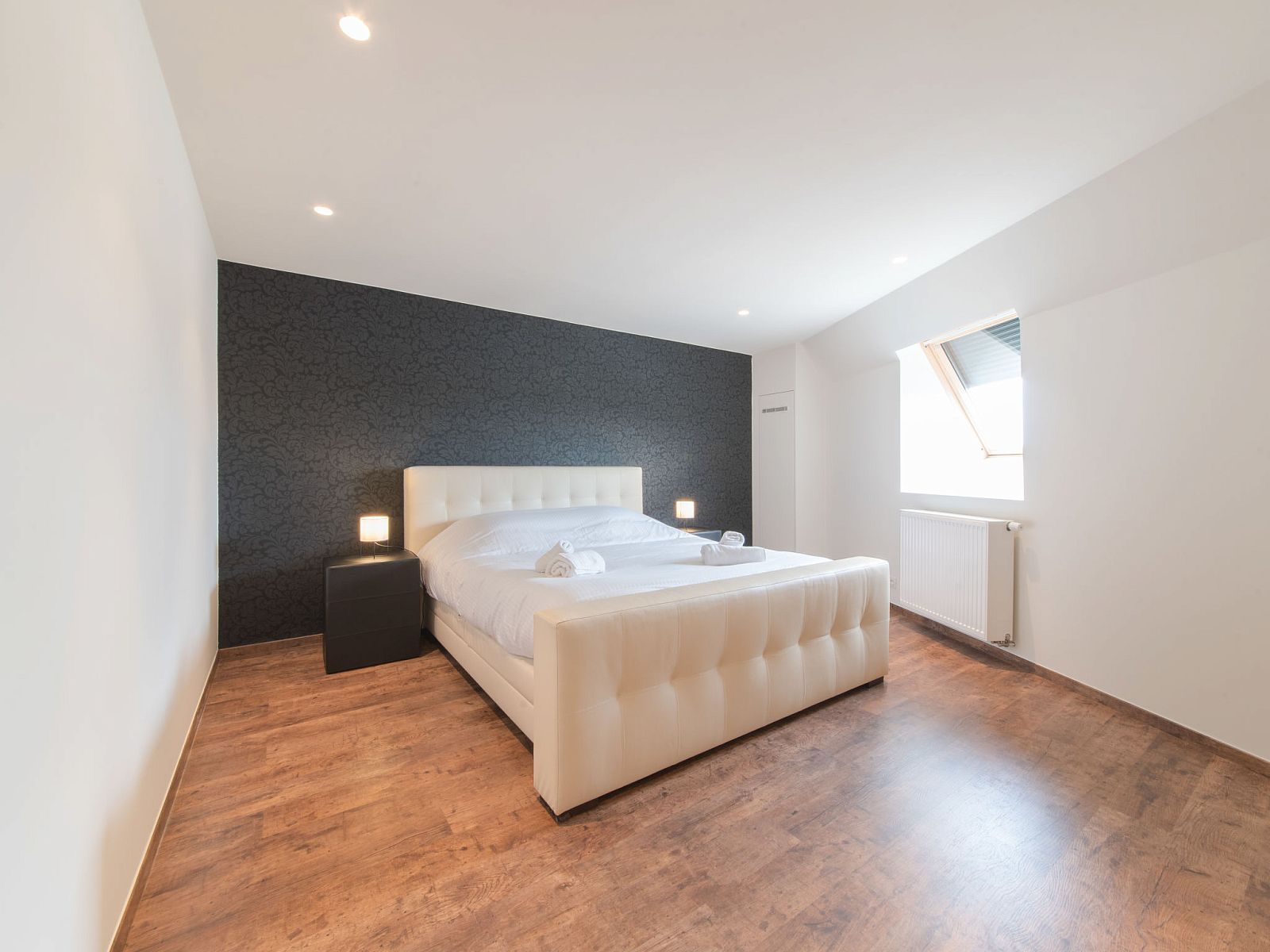 Stylish bedroom in Apartment Alaska Beach in Bredene, Belgian coast, offers comfort and tranquility for a relaxing stay.