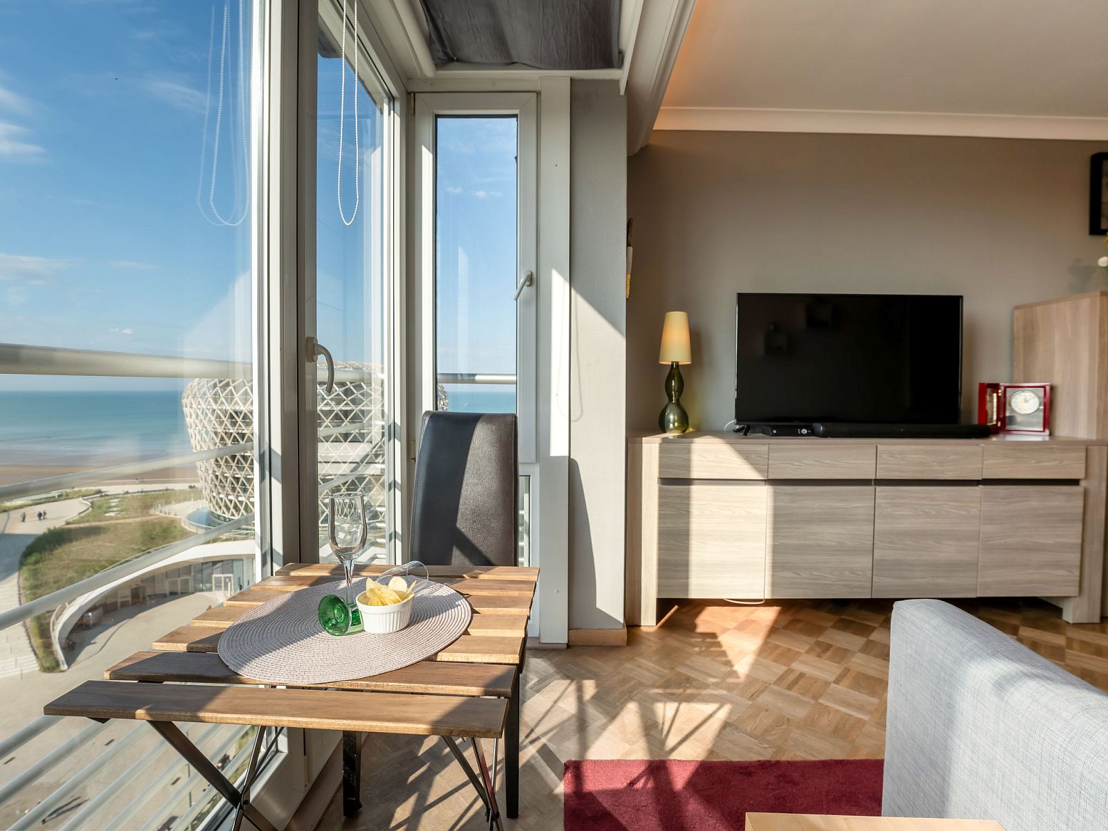 Apartment Ravenna in Middelkerke offers a beautiful sea view from the modern living room on the Belgian coast.