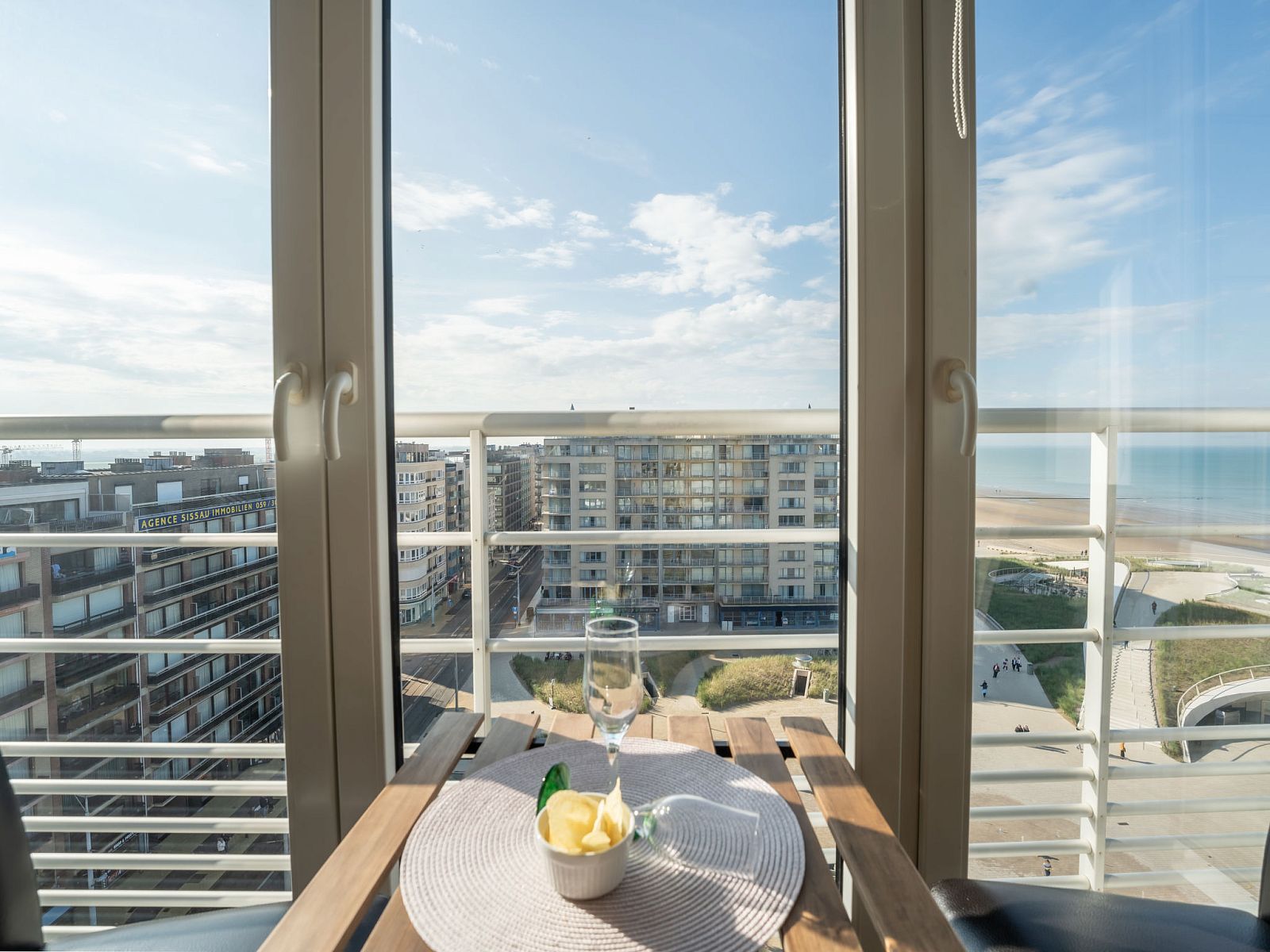 Enjoy the sea view from the balcony of Apartment Ravenna in Middelkerke on the Belgian coast, a perfect vacation rental.