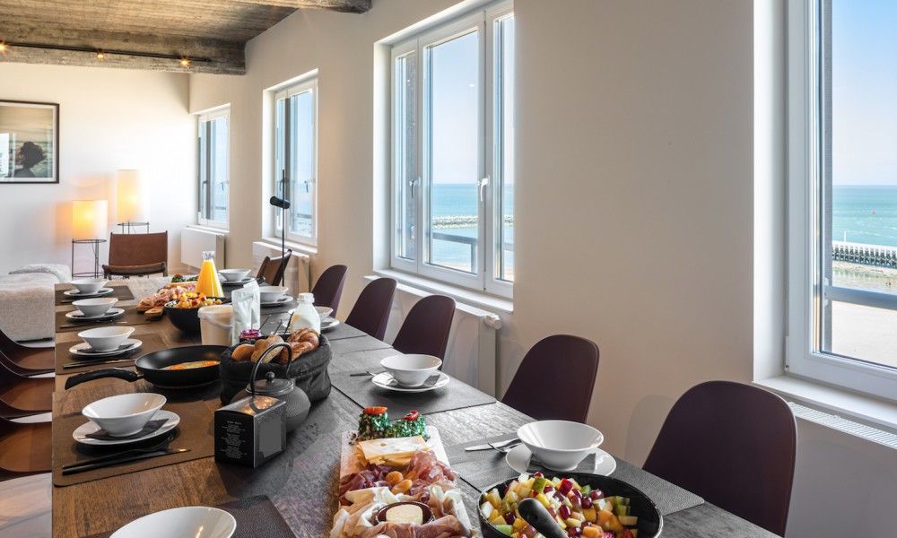 Gezellige eetruimte met zeezicht in Logeren met zeezicht, Oostende, Belgische kust appartement.