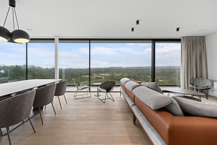 Penthouse 'Ter Elst' in De Panne, Belgian coast: Luxury apartment with panoramic views of nature from the modern living space.