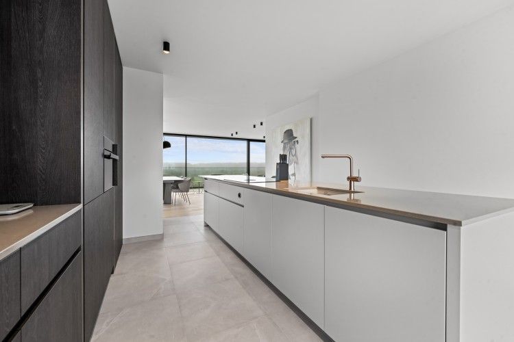 Modern kitchen in Penthouse 'Ter Elst', a luxury apartment in De Panne, Belgian coast, with sea views and stylish interior.