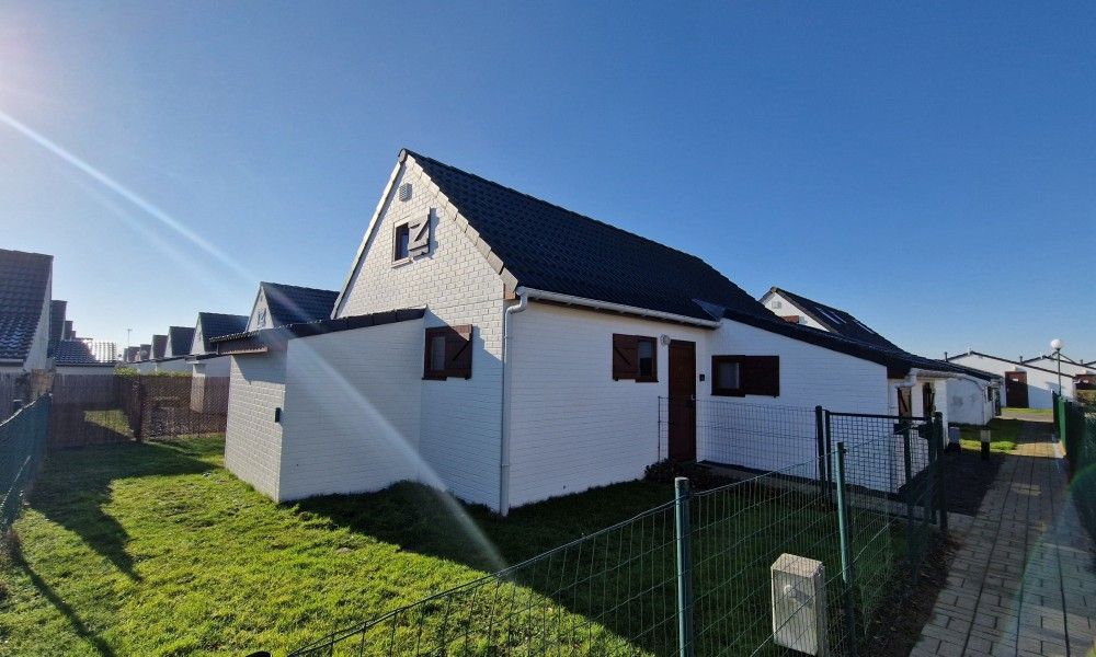 Vissershuisje 89 in Wenduine, rustieke vakantieaccommodatie met ruime tuin aan de Belgische kust.