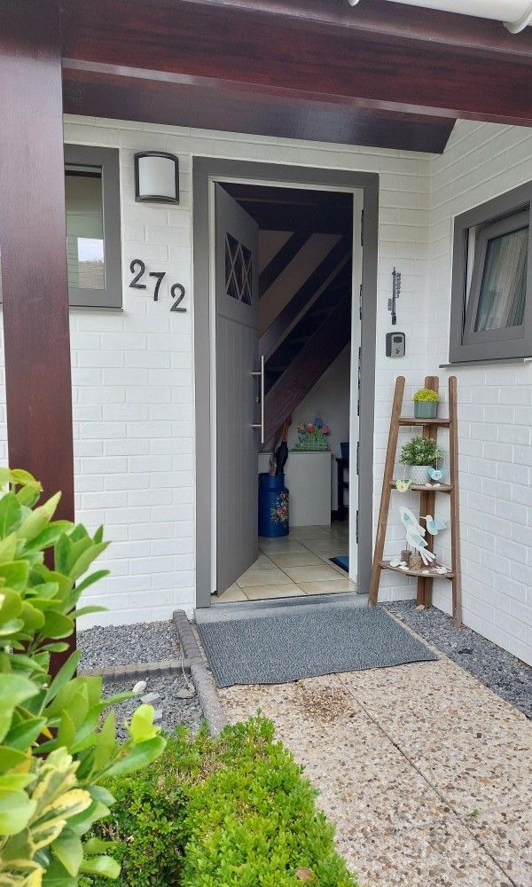 Haustuer des Ferienhauses Duinendaele 272 in Adinkerke, De Panne, Belgische Kueste, Belgien.