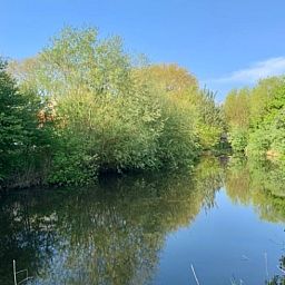 Cozy kitchen in Cottage in Alveringem, cottage in West Flanders, Belgium with rustic brick walls and modern amenities.