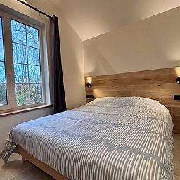 Modern bathroom in Cottage in Alveringem, a vacation home in Alveringem, West Flanders, with stylish sink and rustic look.