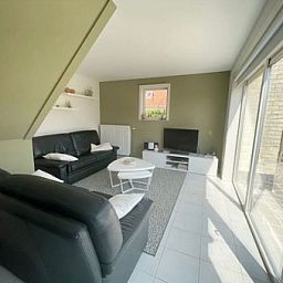 Gezellige woonkamer in Residentie Arthur - Lombardsijde vakantiehuis, West-Vlaanderen.