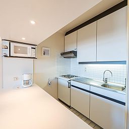 Modernes Interieur von Brisbane II - 0202, einem Ferienhaus in Middelkerke, Westflandern, mit stilvoller Kueche und gemuetlicher Sitzecke.