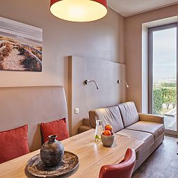 Gemuetliches Innenstudio fuer Familien in Middelkerke, Westflandern. Ideales Ferienhaus fuer Familien mit Blick auf den Garten.