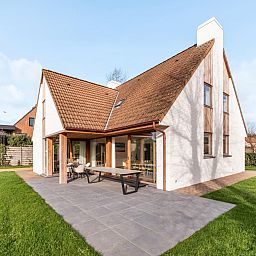 Ferienhaus "Pure Relax" in Oostduinkerke, Westflandern, mit grosszuegiger Veranda und gruenem Garten - ideal zum Entspannen in der Natur.