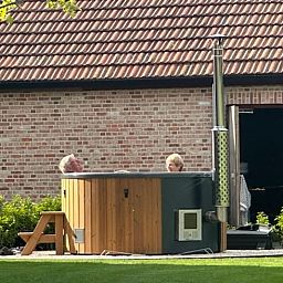 Enjoy relaxing in the hot tub at Holiday Home in Kasterlee, located in green Antwerp, Belgium.