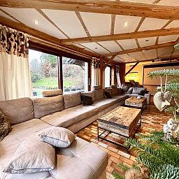 Relax in the recreation room of Leora Cosy, a vacation home in Membre, Ardennes, Belgium, with an inviting pool table.