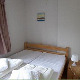 Prachtige natuurlijke omgeving van ARD103 in Dochamps, Ardennen, met weids uitzicht op groene heuvels.