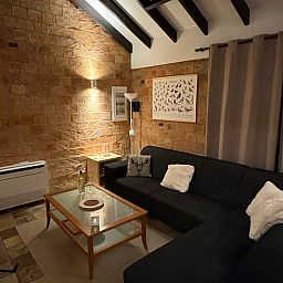 Cozy living room in Holiday home in Izier, Ardennes, Belgium with comfortable seating area and atmospheric lighting.