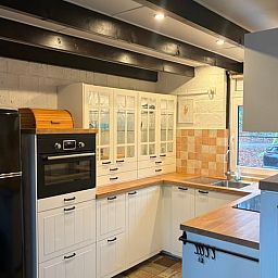 Modern kitchen in Cottage in Izier, located in the Ardennes, Luxembourg, Belgium. Cozy indoor space with country charm.
