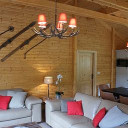 Cozy living room of Cottage in Erezee, located in the Ardennes, Belgium. Perfect vacation home with wooden interior and modern amenities.