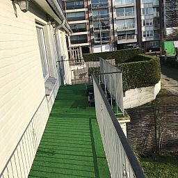 Balkon van Appartement fur 4 Personen und 1 Kind in Knokke-Heist, met uitzicht op de Belgische kust, ideaal voor ontspanning.