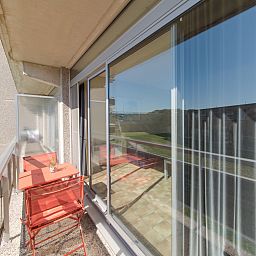 Enjoy the sunny terrace at Apartment 103 in Bredene, Belgian coast. Perfect for a relaxing stay by the sea.