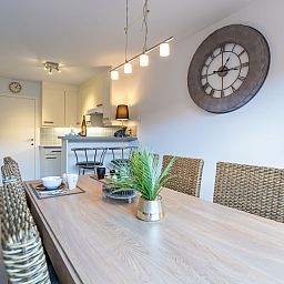 Cozy dining area in Apartment Residentie Zandloper, Bredene, Belgian coast. Perfect vacation accommodation with modern kitchen.